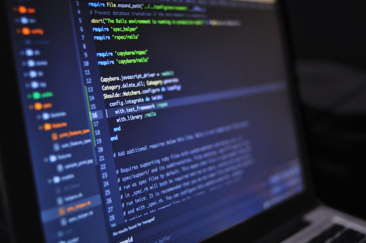 Close-up of programming code on a dark screen, showing structured logic and syntax